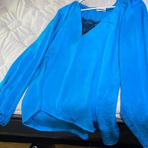 Cute, silky, oversized, flowy shirt. Size L